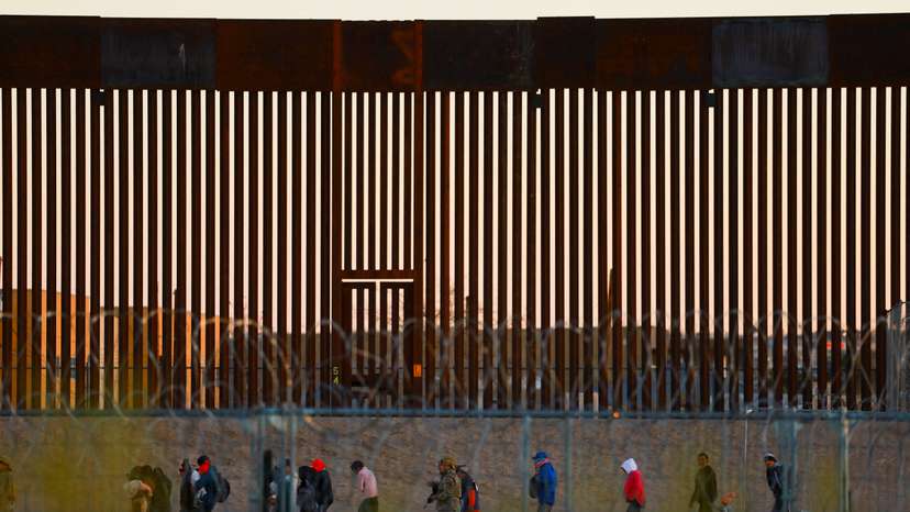 Migrants seeking asylum in the United States gather on the banks of the Rio Bravo river during a cold day in Ciudad Juarez
