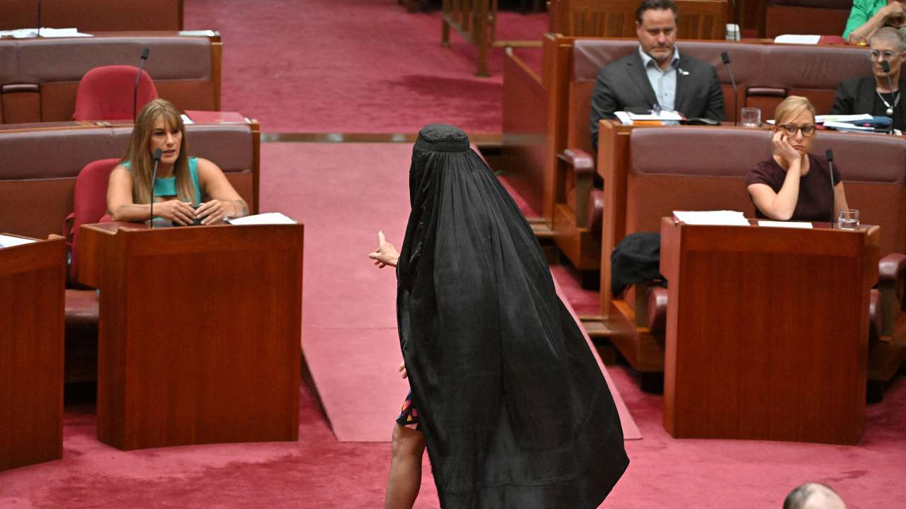 Australian far-right senator wears burqa to parliament, sparking outrage