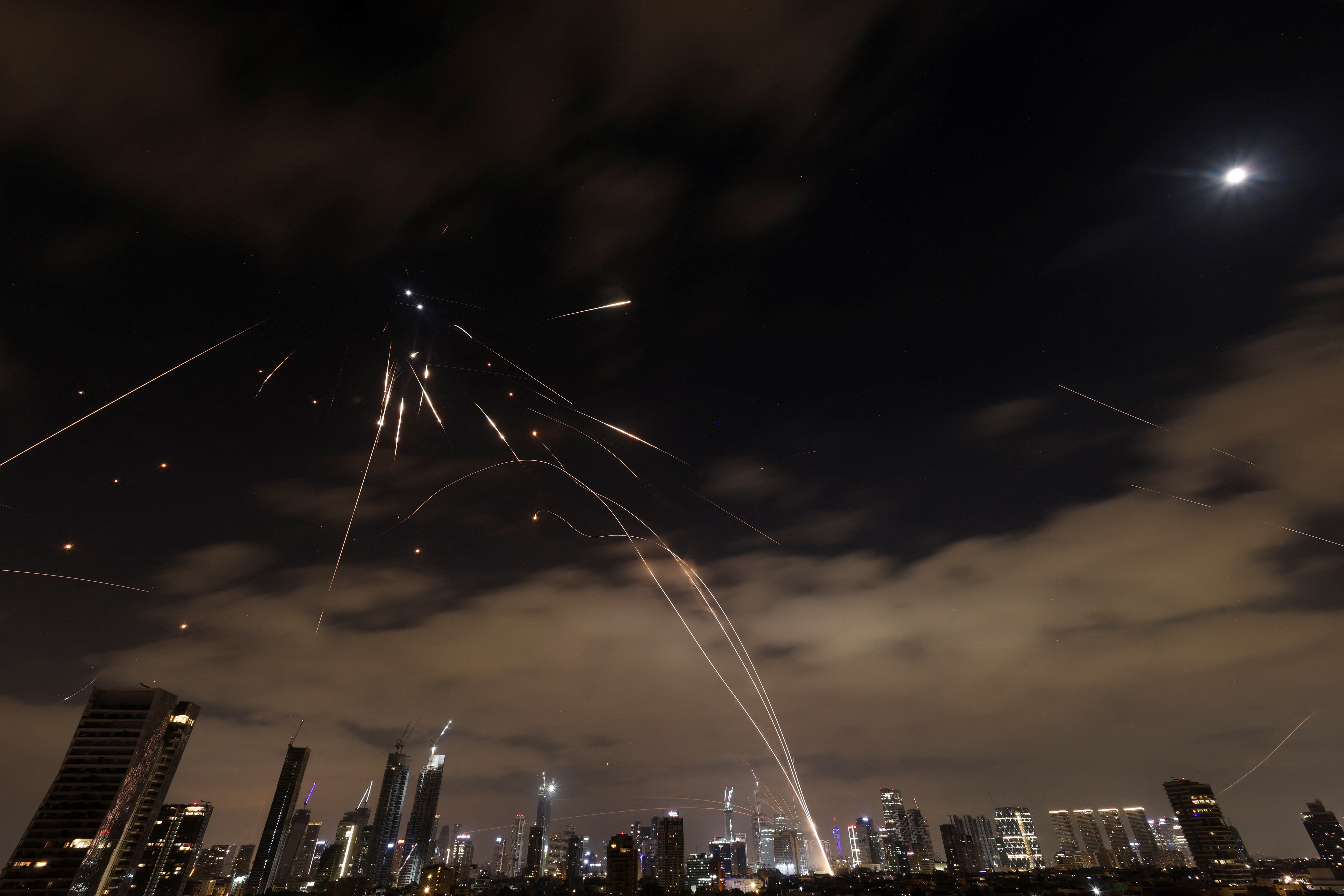 Missiles launched from Iran are intercepted as seen from Tel Aviv