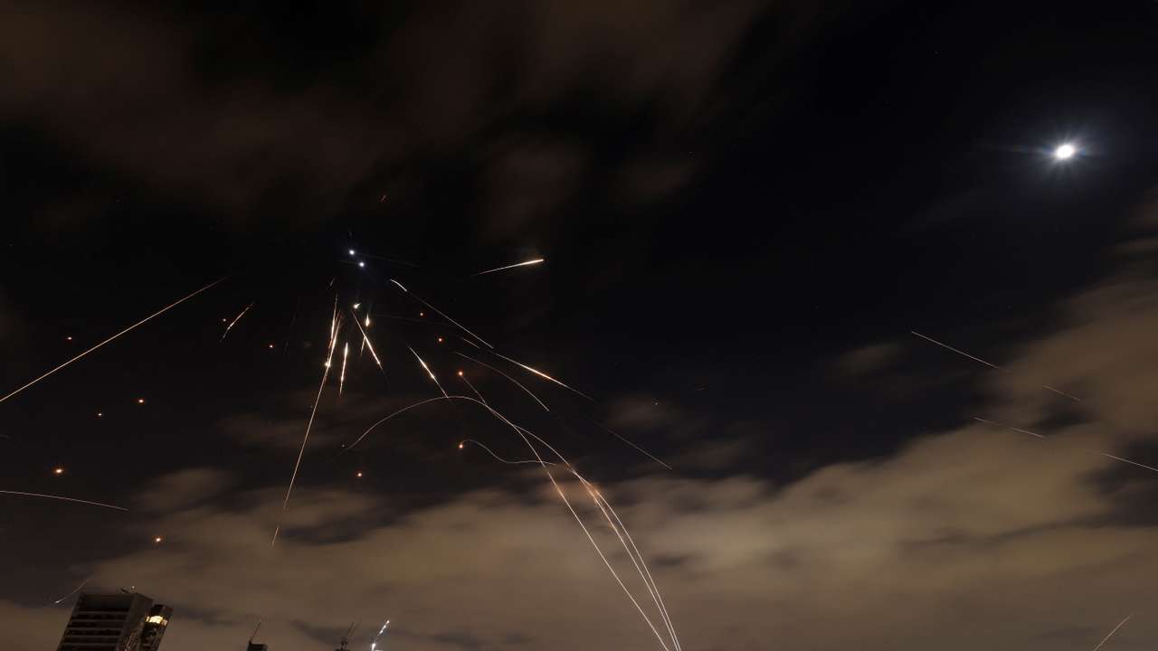 Missiles launched from Iran are intercepted as seen from Tel Aviv