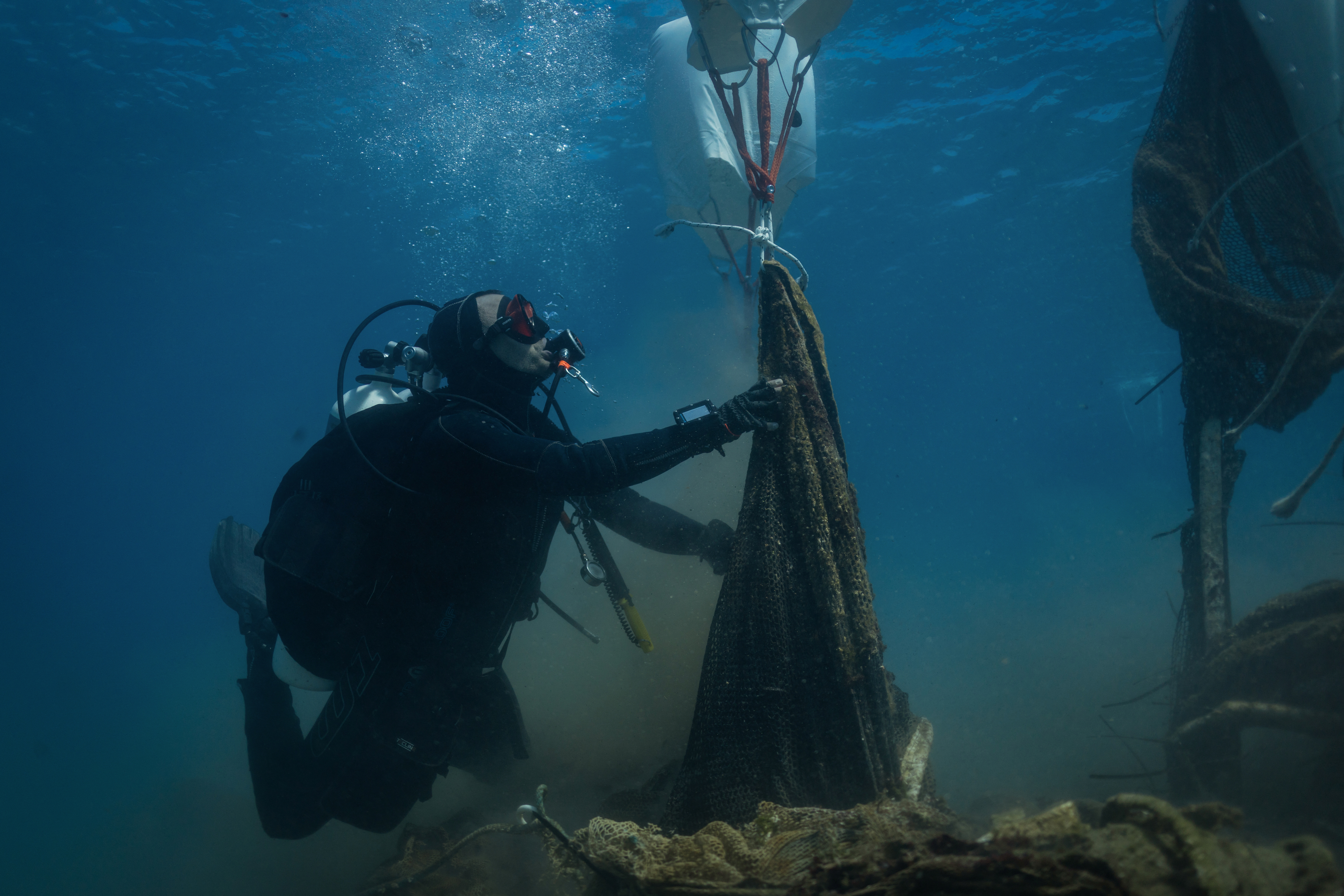 Volunteer divers remove tons of ghost nets smothering the Greek seabed