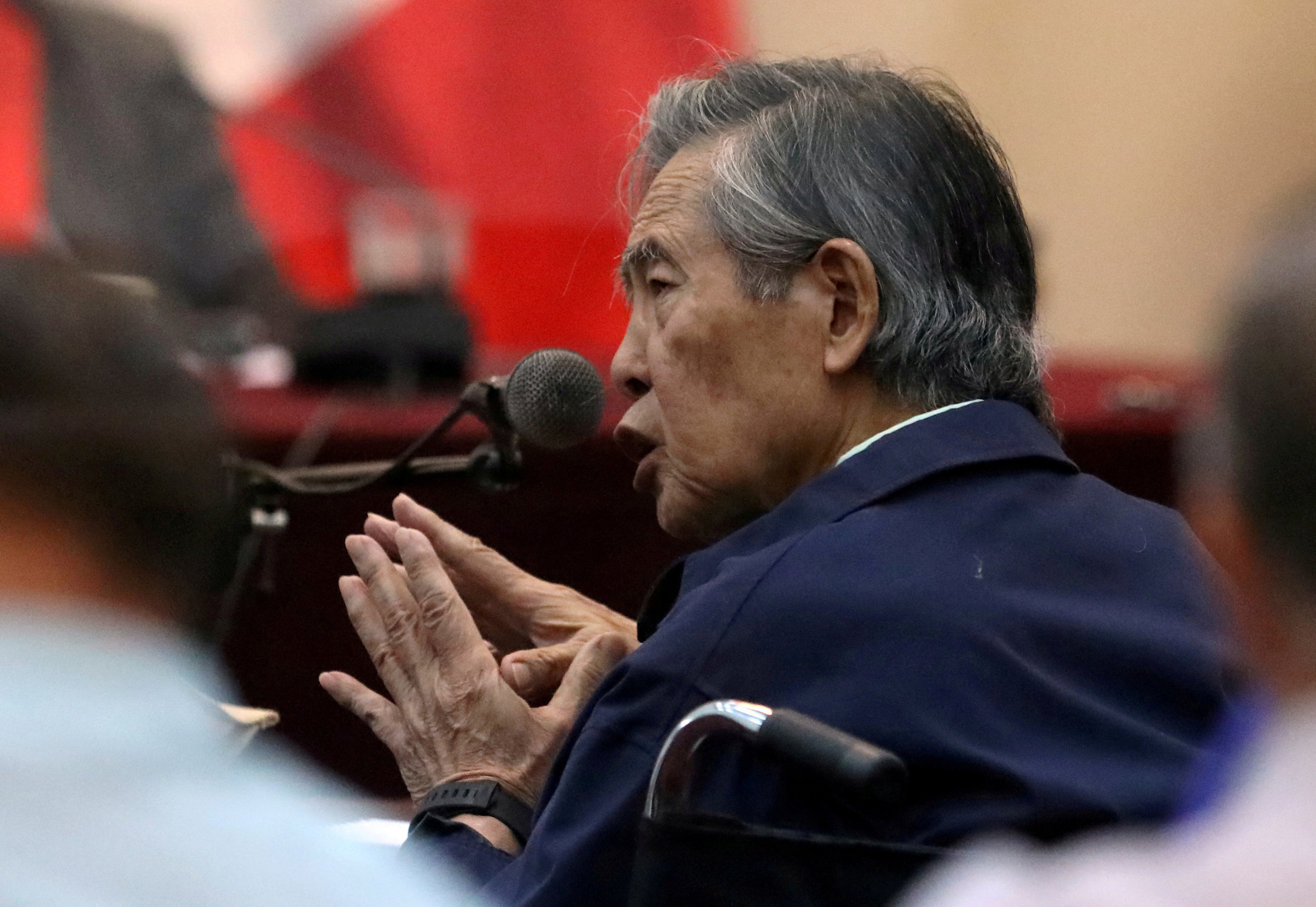 FILE PHOTO: Former President of Peru Alberto Fujimori attends a trial as a witness at the navy base in Callao