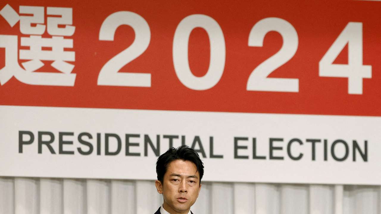 FILE PHOTO: Japanese former Environment Minister Shinjiro Koizumi speaks in Tokyo