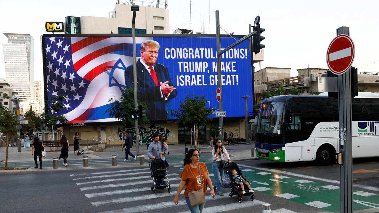 Republican presidential nominee and former U.S. President Donald Trump appears on a congratulatory billboard for the 2024 U.S Presidential Election, in Tel Aviv