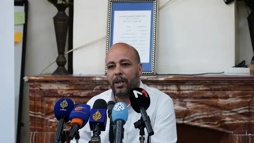 Romdhane Ben Amor of the Tunisian Forum for Economic and Social Rights, an independent advocacy group attends a press conference in Tunis