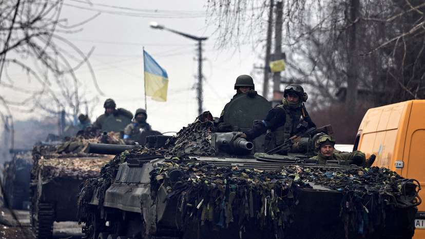FILE PHOTO: Ukrainian soldiers are pictured in their tanks, amid Russia's invasion on Ukraine, in Bucha, in Kyiv region