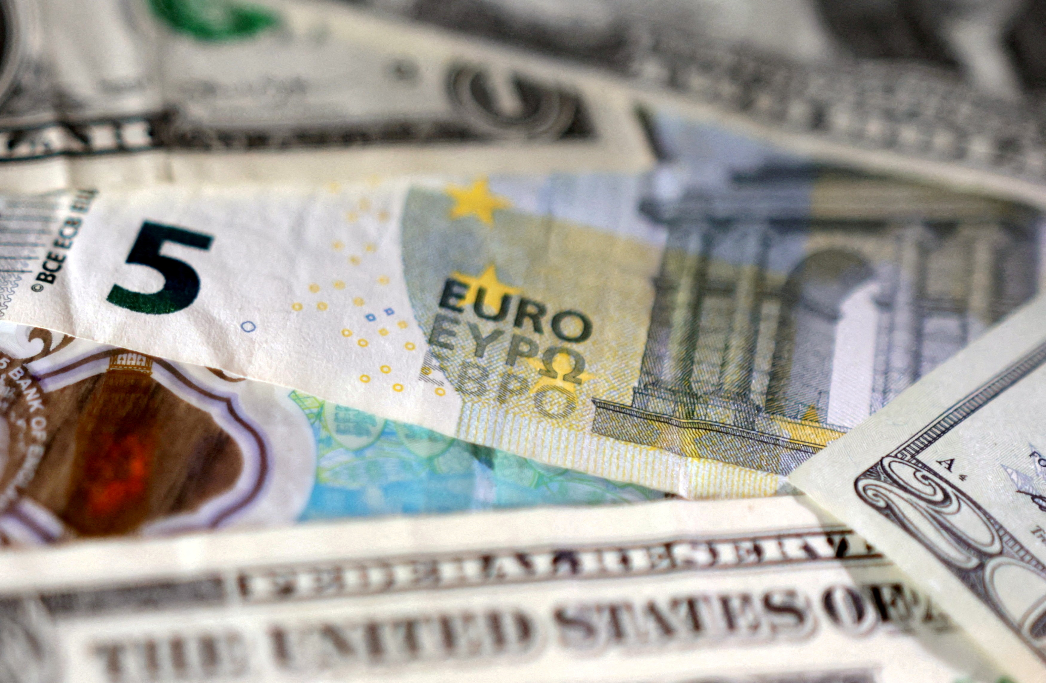 FILE PHOTO: Illustration shows Euro and U.S. dollar