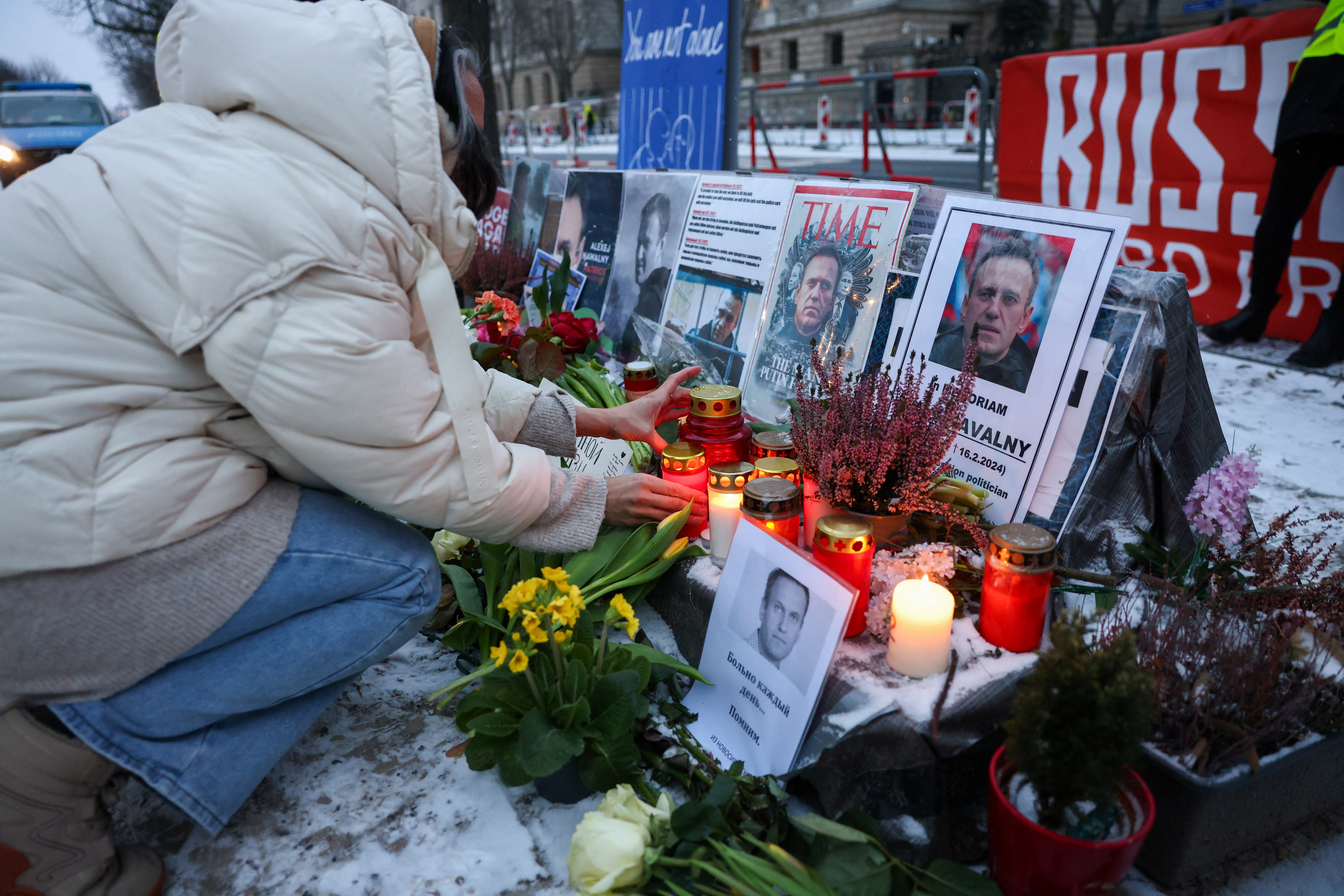 Supporters of late Kremlin critic Alexei Navalny protest outside the Russian Embassy in Berlin