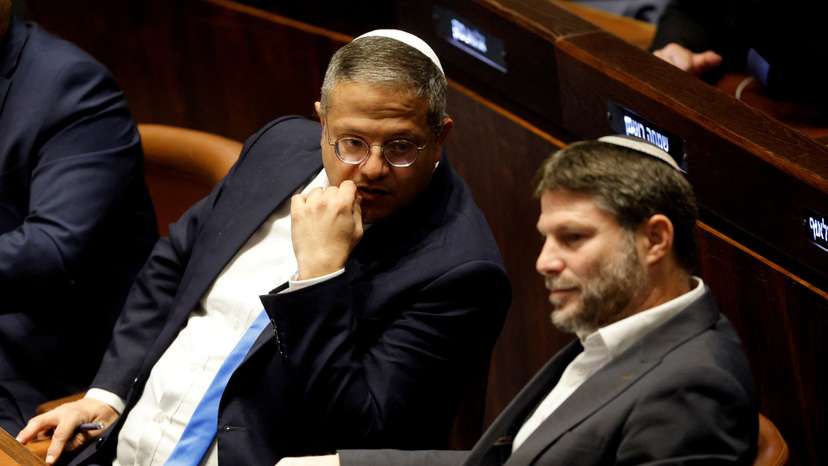 FILE PHOTO: Right-wing Knesset members Itamar Ben-Gvir and Bezalel Smotrich attend a special session at the Knesset Israel's parliament, to approve and swear in a new right-wing government, in Jerusalem