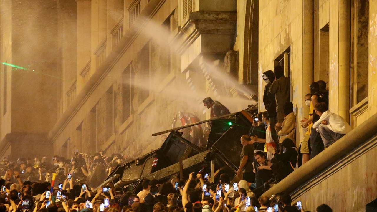 Demonstrators hold a rally to protest against a bill on "foreign agents", in Tbilisi