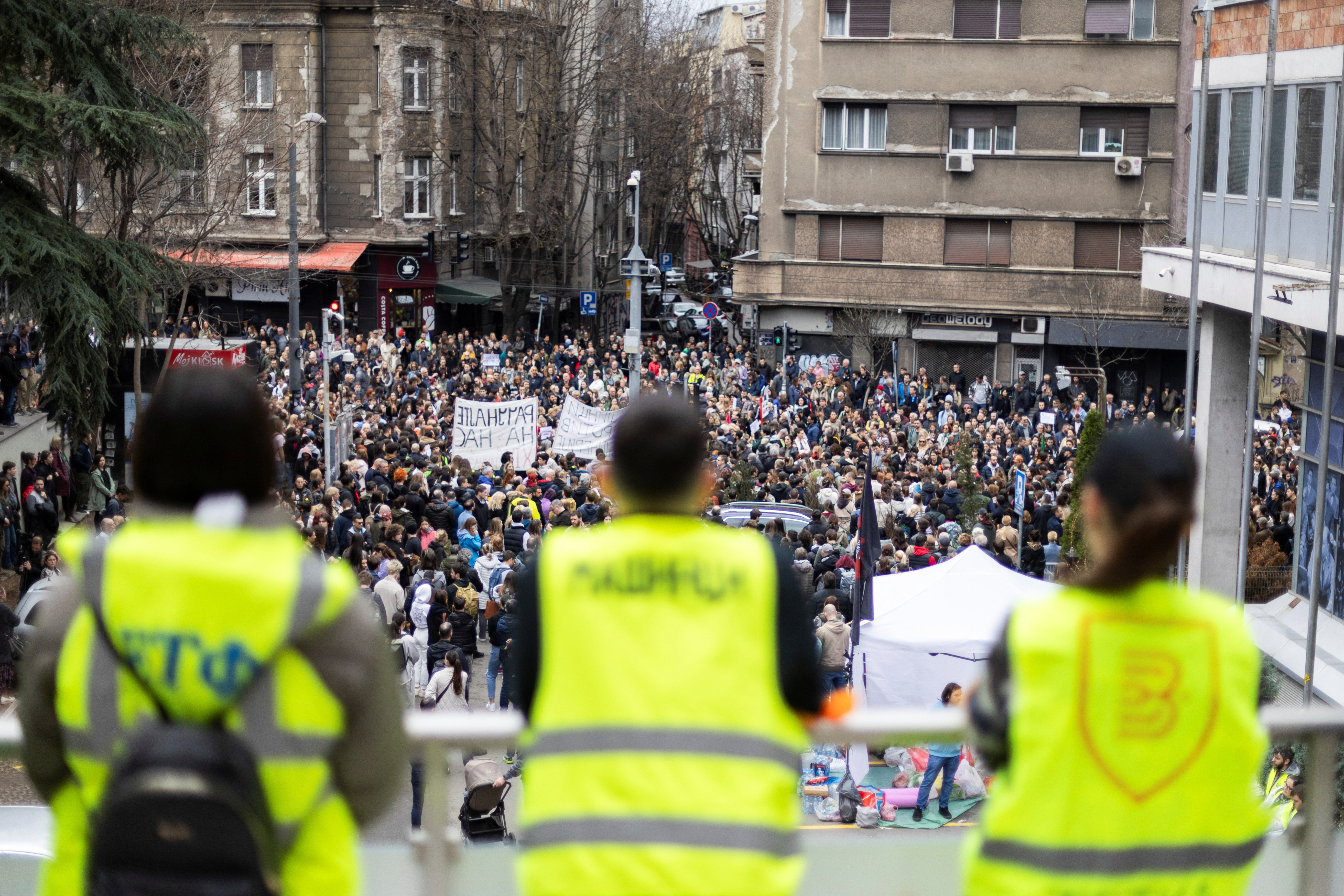 Students and anti-government protesters block access to the offices of RTS, in Belgrade