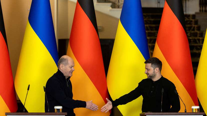 FILE PHOTO: German Chancellor Olaf Scholz meets Ukrainian President Volodymyr Zelenskiy in Kyiv