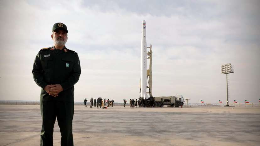 Amirali Hajizadeh, head of the aerospace division of the Revolutionary Guards, stands before a launch of the first military satellite named Noor into orbit by the Iran's Revolutionary Guards Corpse, in Semnan