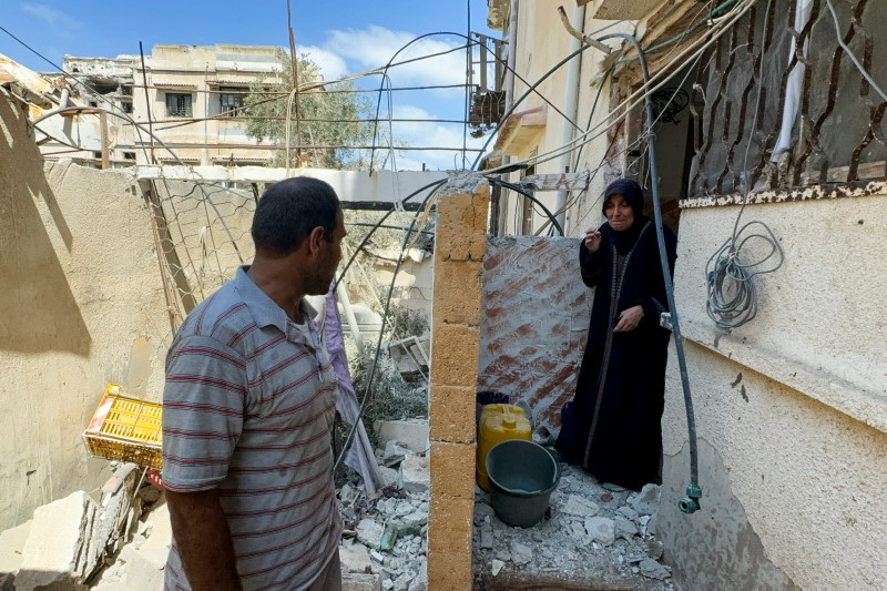 Aftermath of an Israeli strike on a house in Gaza City