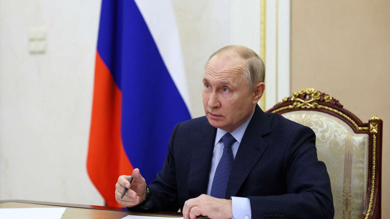 Russian President Vladimir Putin chairs a Security Council meeting in Moscow