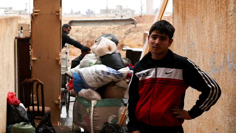 FILE PHOTO: Former Assad regime officers vacate homes for incoming rebel families