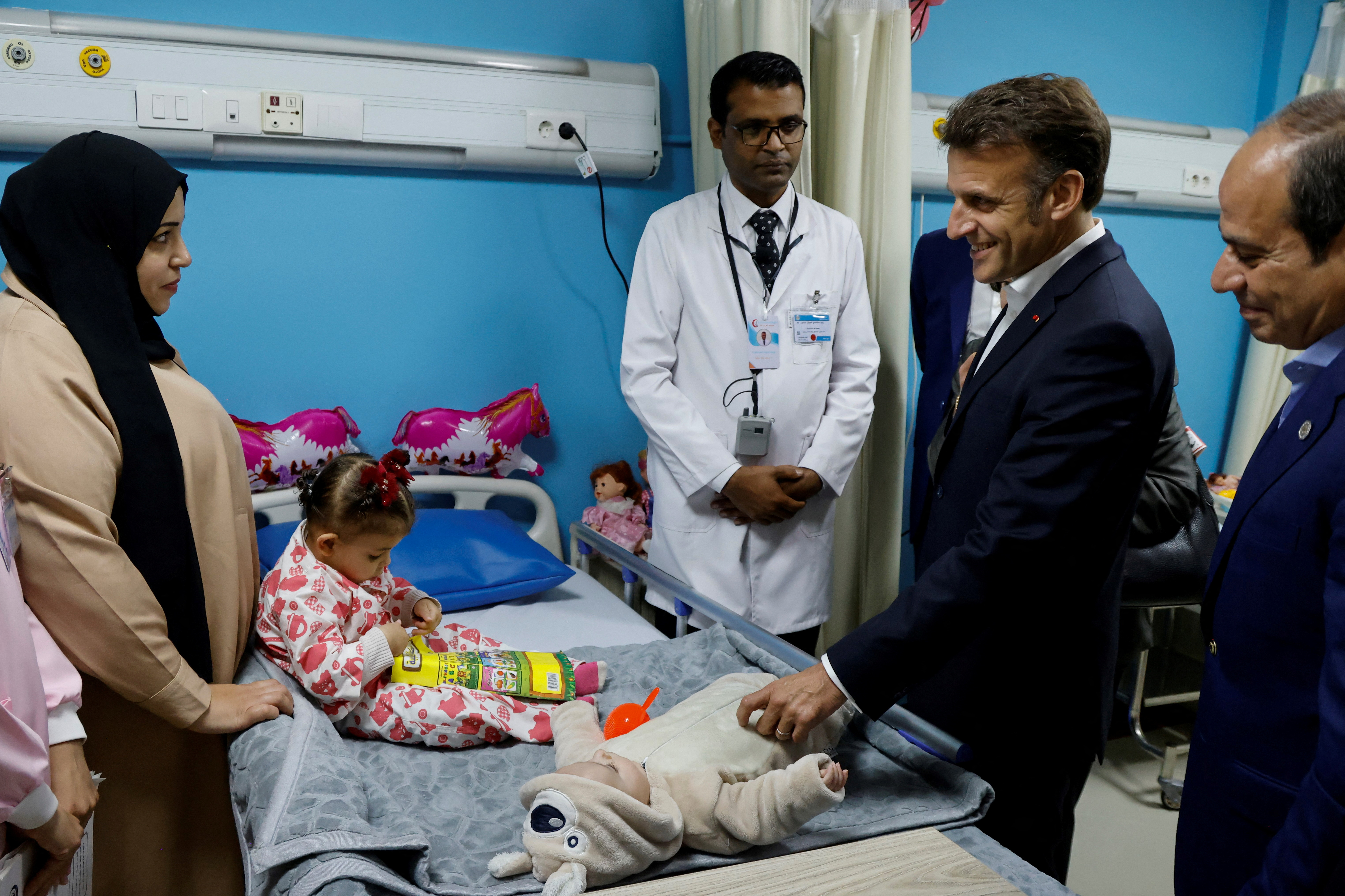 Egypt's President Abdel Fattah al-Sisi and French President Emmanuel Macron visit El Arish Hospital