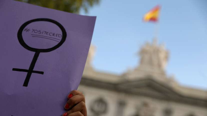 FILE PHOTO: Women gather outside the Supreme Court after Spain's top court found five men known as the "Wolf Pack" guilty of rape in Madrid