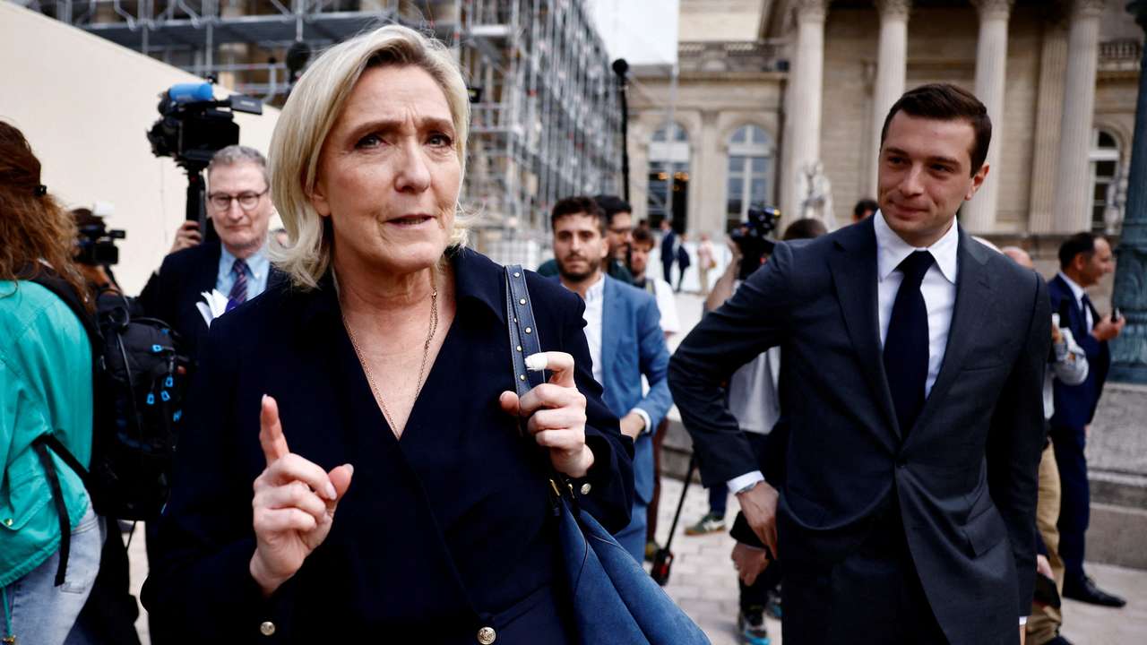 Newly elected lawmakers make entry to the National Assembly in Paris