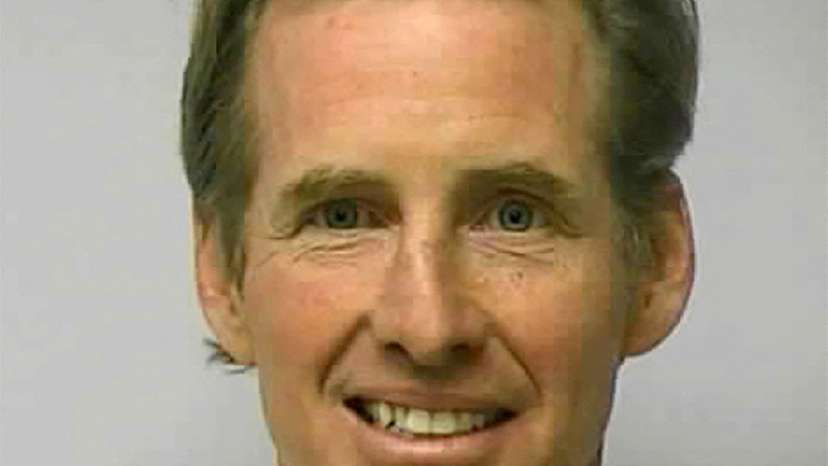 FILE PHOTO: Ryan W. Routh poses in a jail booking photograph in Greensboro