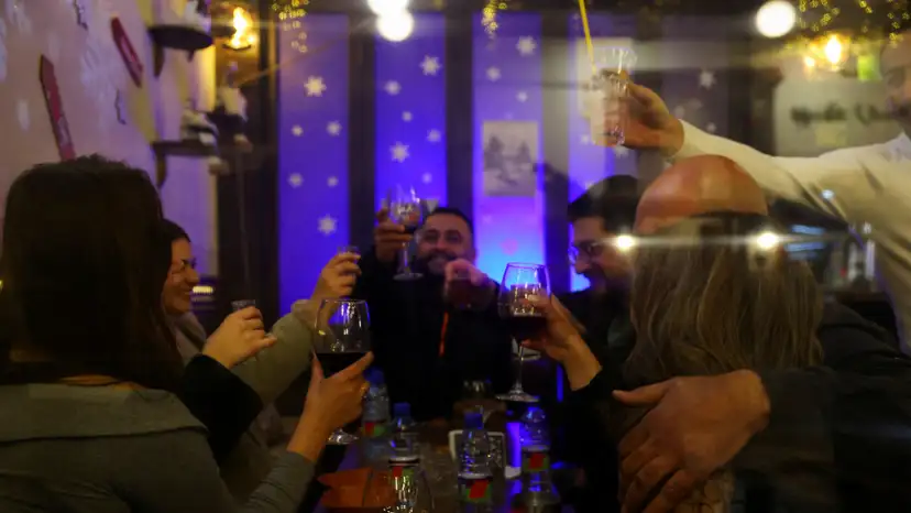 FILE PHOTO: People enjoy a night out in the Bab Touma neighbourhood of the Old City of Damascus