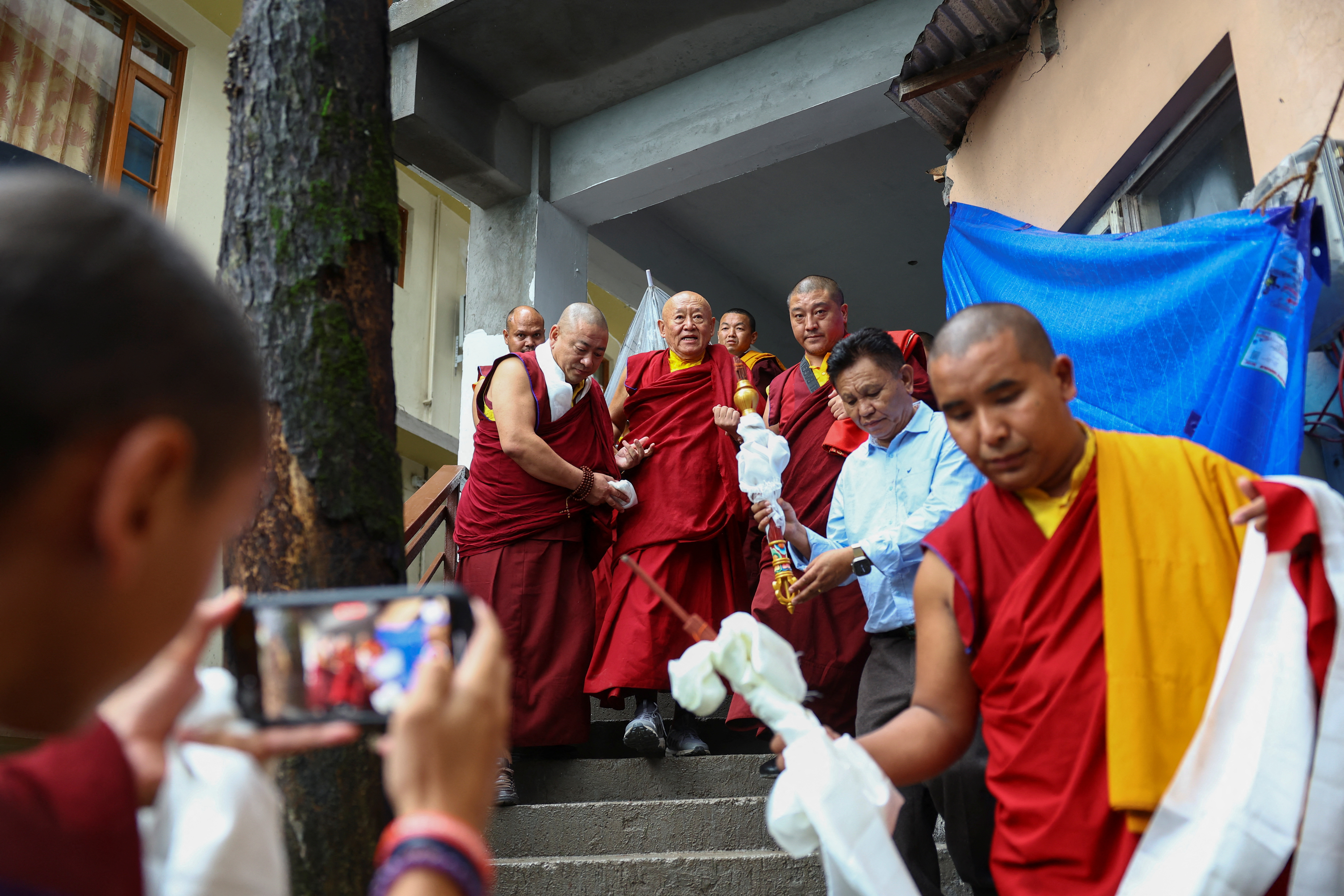 His Holiness the Drikung Kyabgon Chetsang, one of two heads of the Drikung Kagyu order of Tibetan Buddhism, arrives at Norbu House hotel in McLeodganj