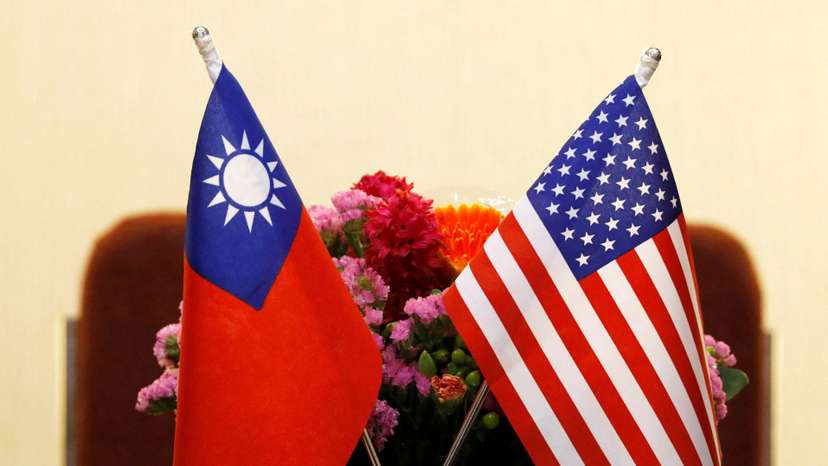 FILE PHOTO: Flags of Taiwan and U.S. are placed for a meeting between U.S. House Foreign Affairs Committee Chairman Ed Royce speaks and with Su Chia-chyuan, President of the Legislative Yuan in Taipei
