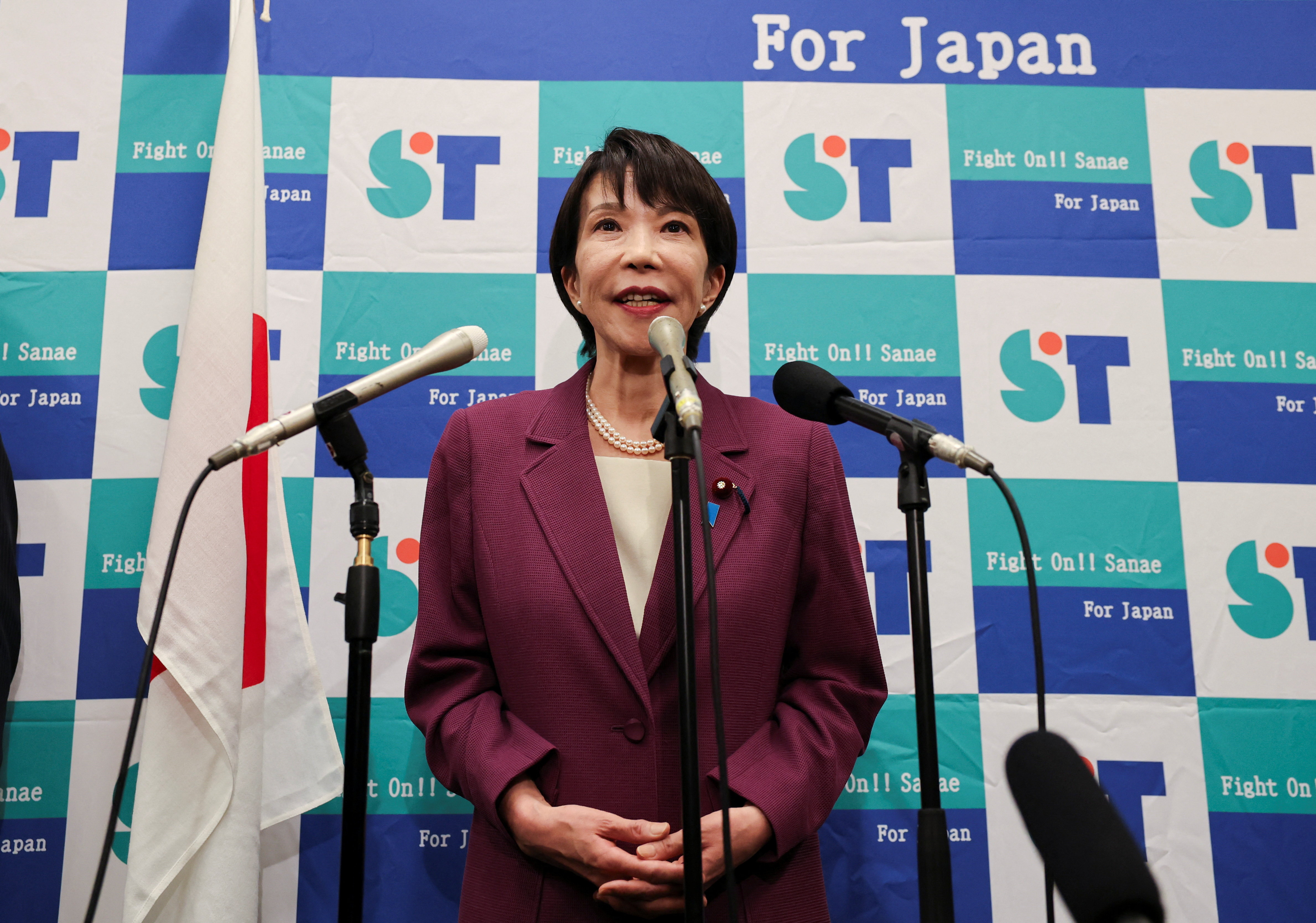 Sanae Takaichi, a veteran Japanese lawmaker and fiscal dove, speaks to reporters about her running in the ruling Liberal Democratic Party leadership race in Tokyo