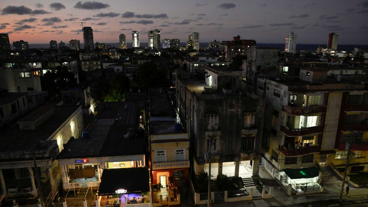 Buildings are illuminated after power was restored following a partial collapse of the electrical grid that left much of western Cuba in the dark, in Havana, Cuba, December 3, 2025. REUTERS/Norlys Perez