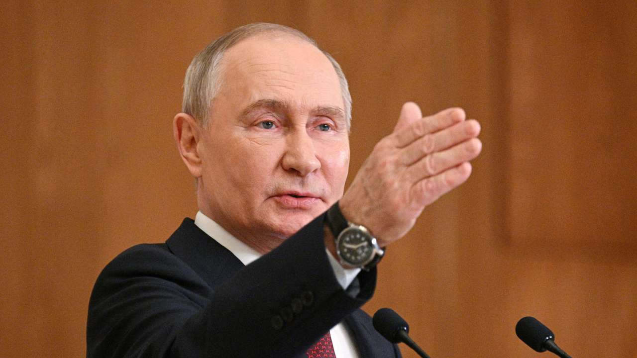 Russian President Putin attends a press conference in Astana