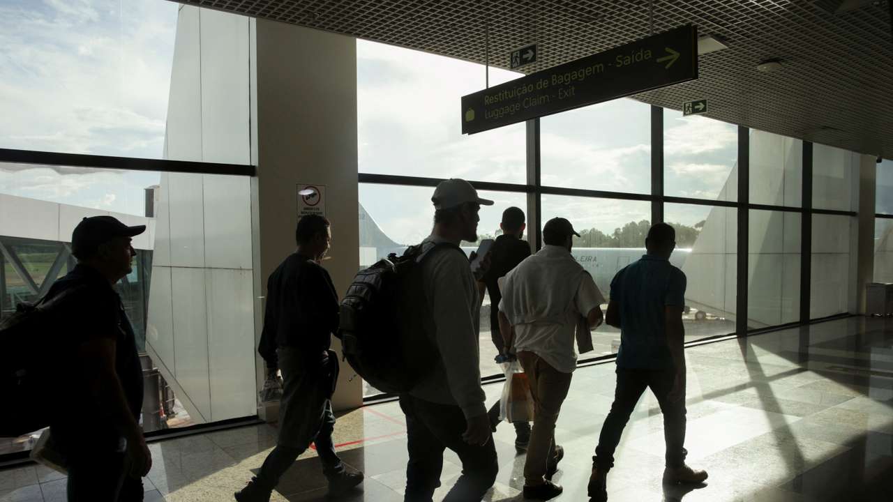 Brazilian migrants deported from the U.S. under President Trump's administration, board a Brazilian Air Force flight, in Manaus