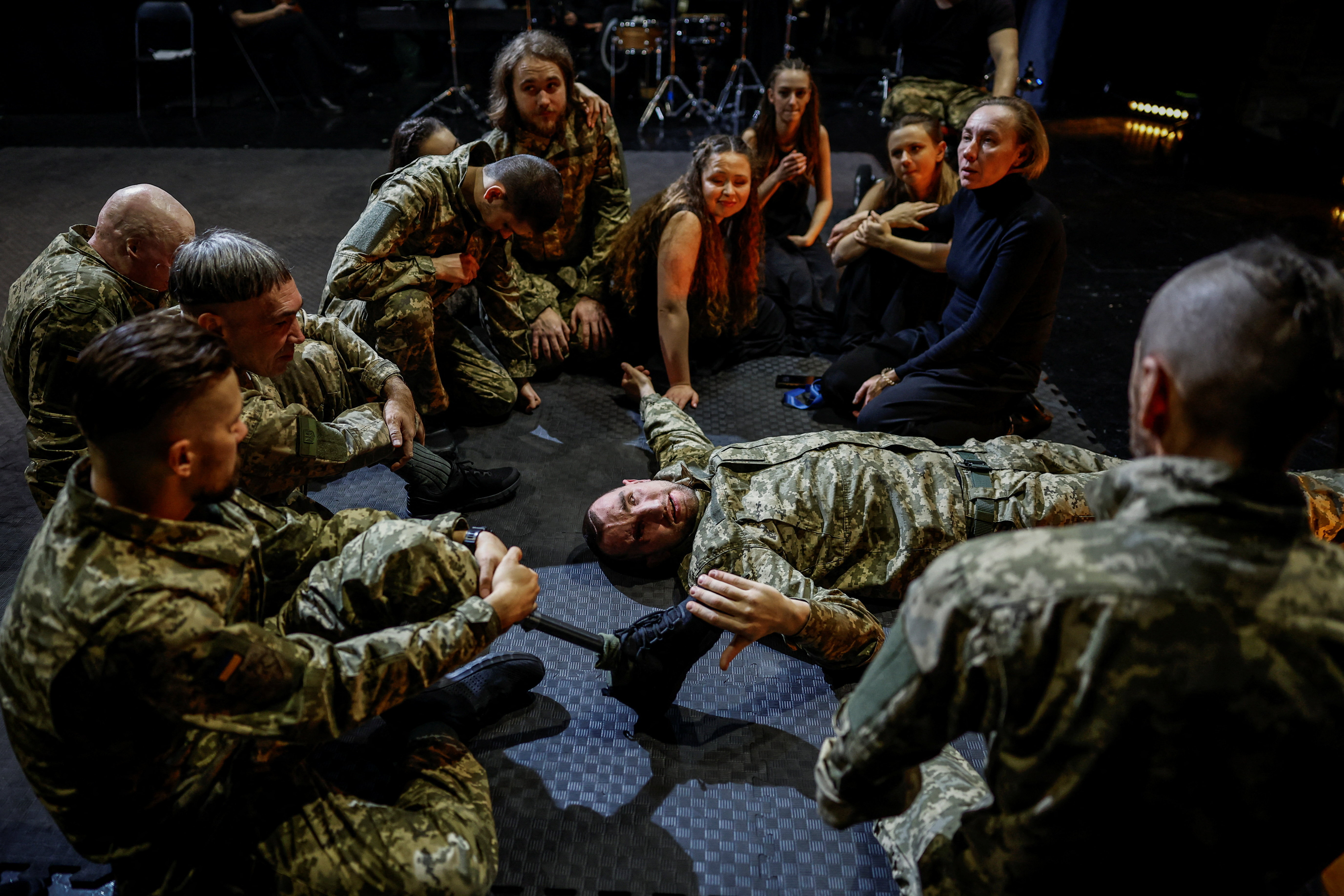 The Wider Image: Wounded Ukrainian veterans find healing on stage