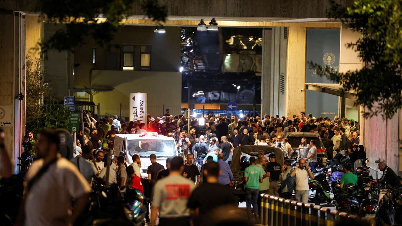 People gather outside a hospital, as more than 1,000 people, including Hezbollah fighters and medics, were wounded on Tuesday when the pagers they use to communicate exploded across Lebanon, according to a security source, in Beirut
