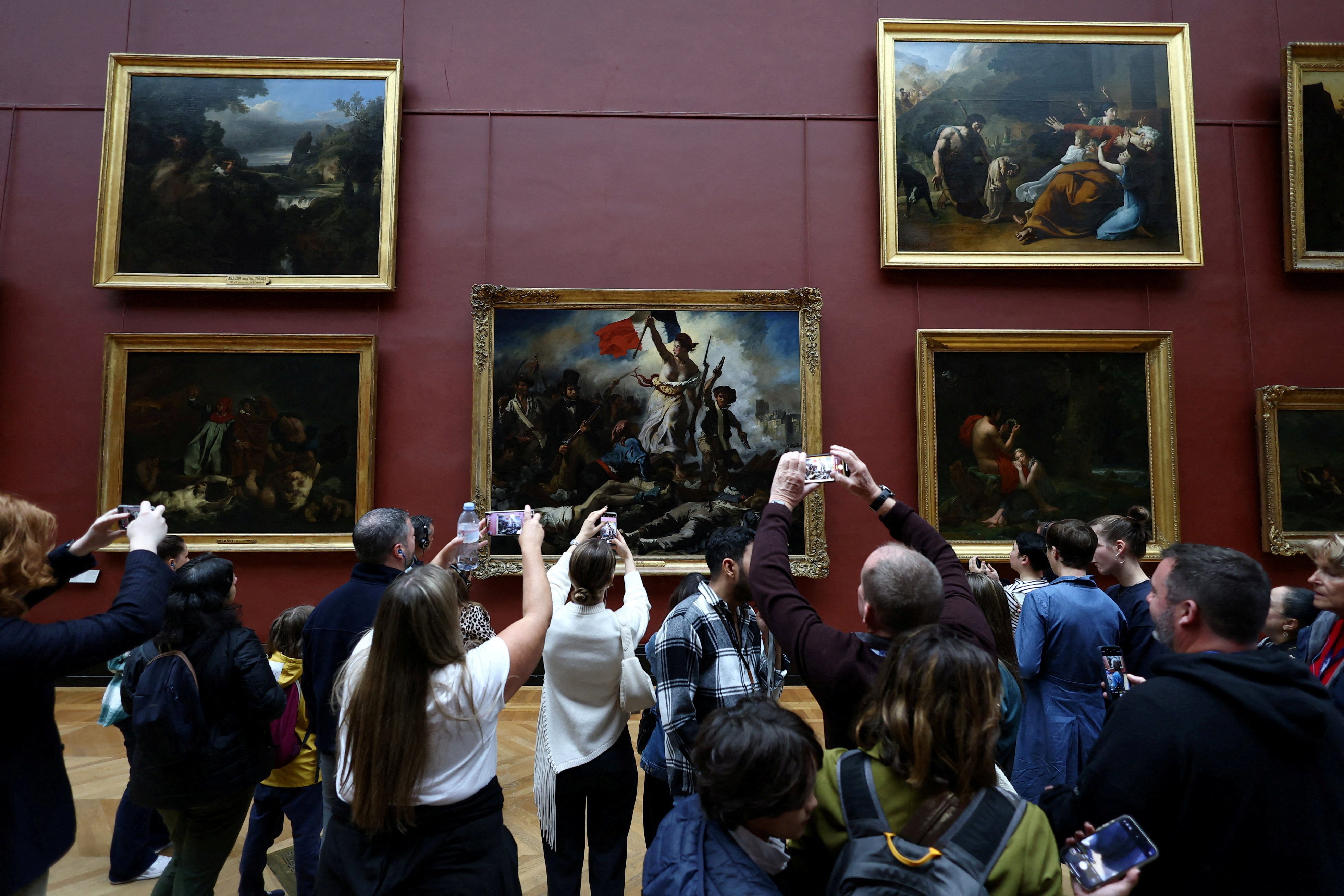 Paris' Louvre Museum re-opens for first time since robbery