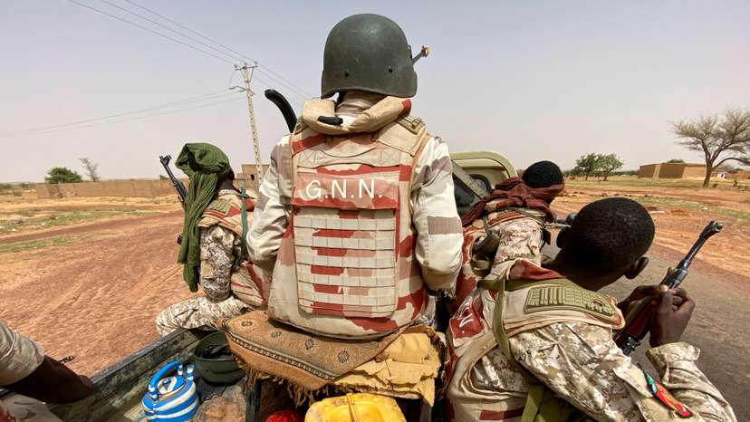 FILE PHOTO: A convoy of Nigerien soldiers patrol outside the town of Ouallam, Niger