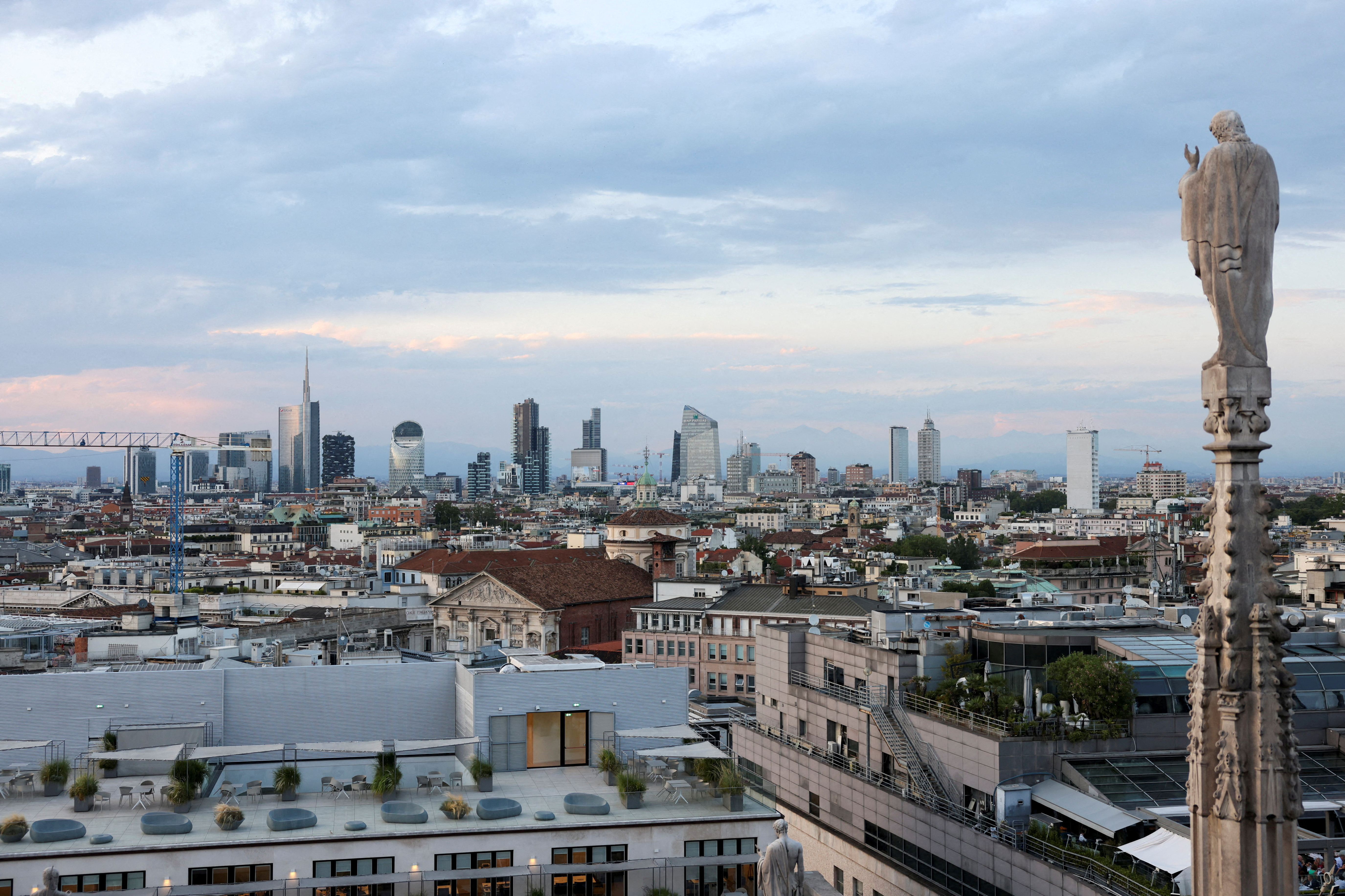 FILE PHOTO: A view shows Milan's skyline during sunset in Milan