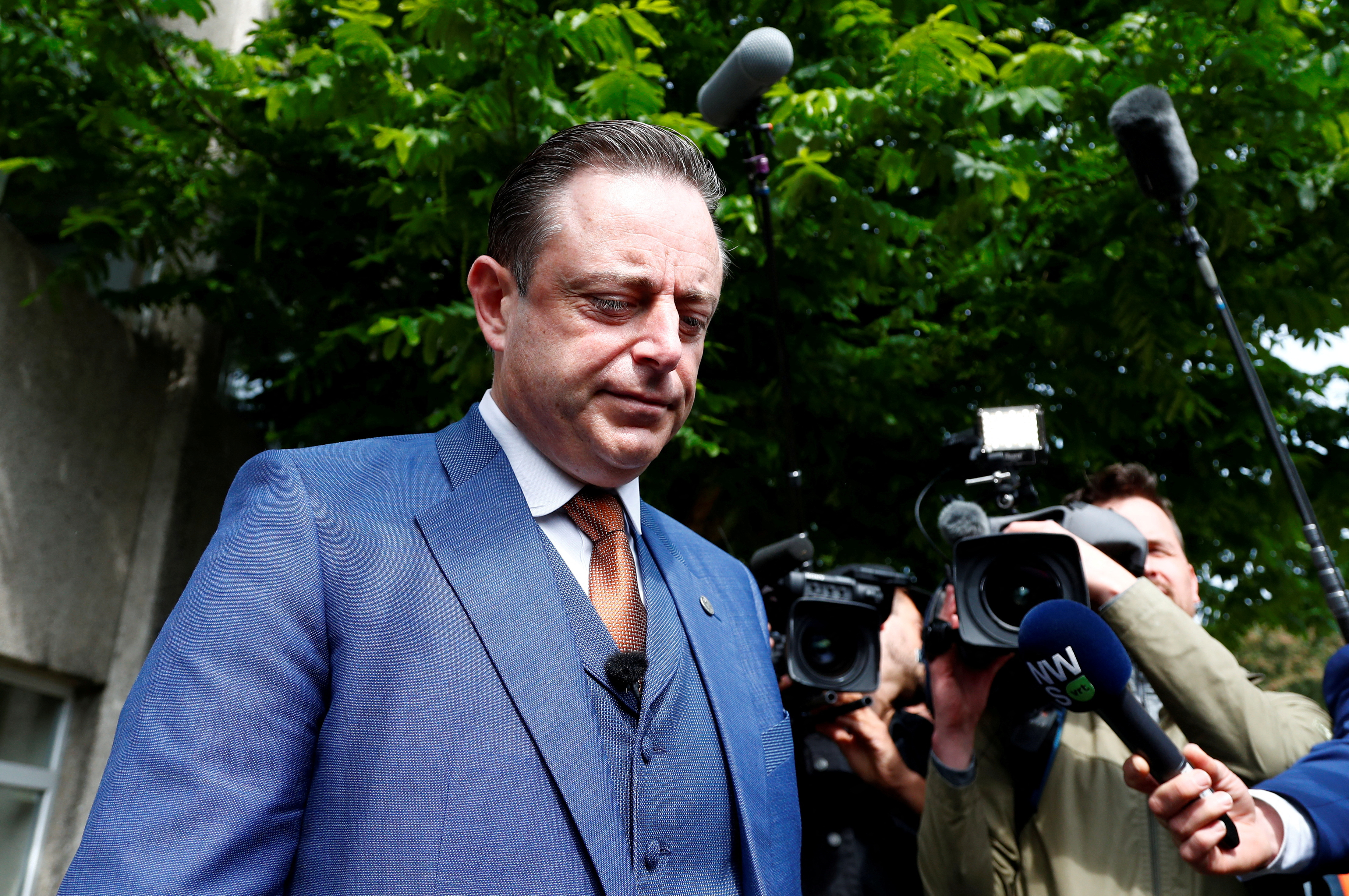 FILE PHOTO: Bart De Wever, President of Flemish nationalist party N-VA, talks to the media after casting his vote for the Belgian general and regional elections and for the European Parliament Elections in Antwerp