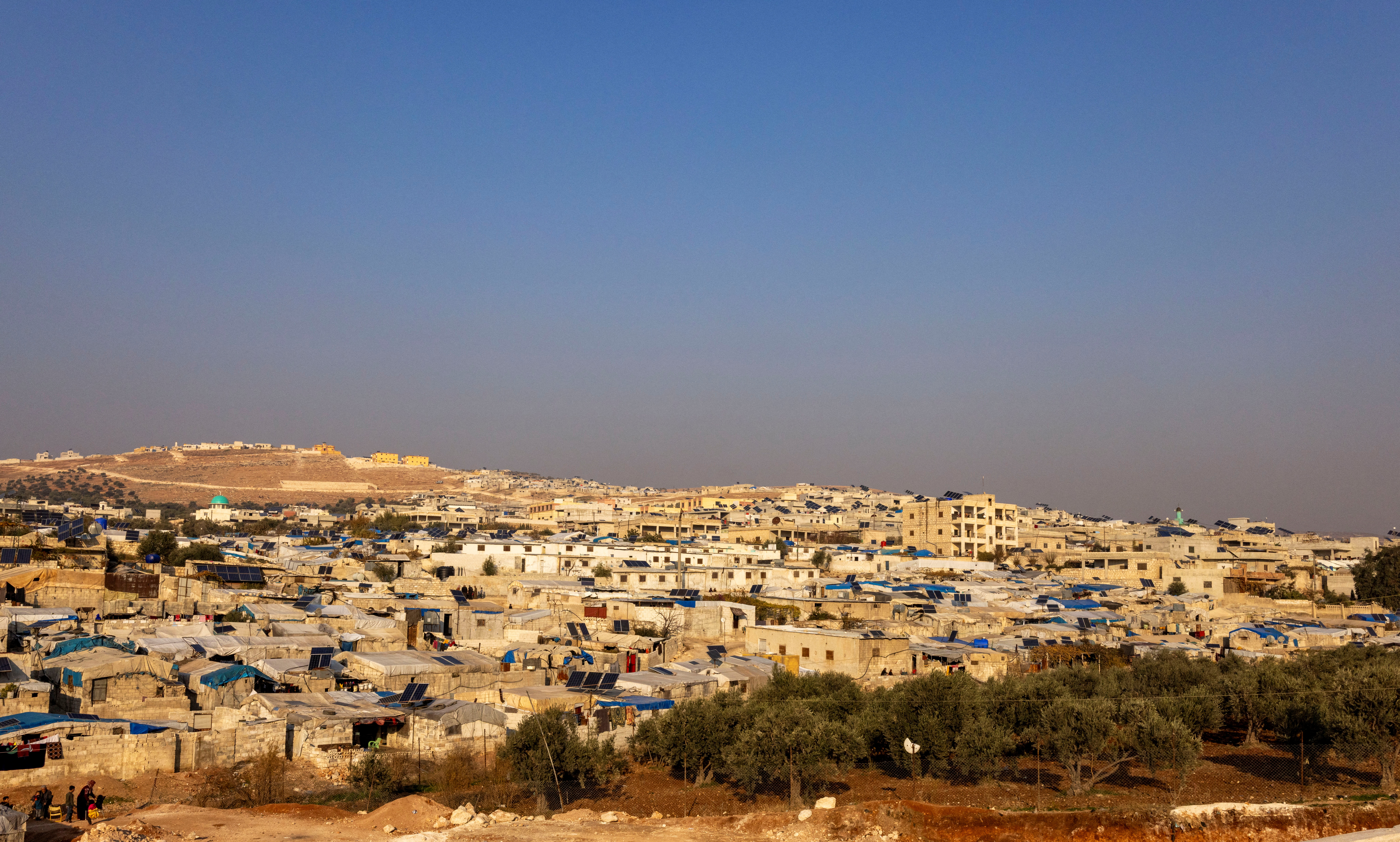 Daily life in Idlib, a Syrian city where HTS had maintained an administration at the time when Syria's civil war front lines were frozen