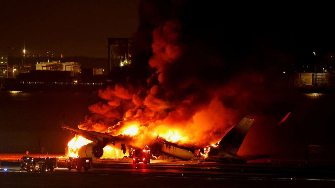 FILE PHOTO: Japan Airlines' A350 airplane on fire at Haneda international airport in Tokyo