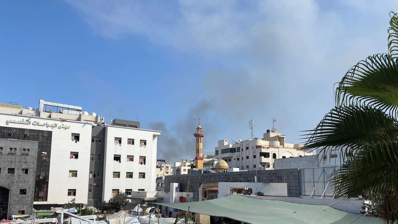 FILE PHOTO: Smoke rises as displaced Palestinians take shelter at Al Shifa hospital, amid the ongoing conflict between Hamas and Israel, in Gaza City