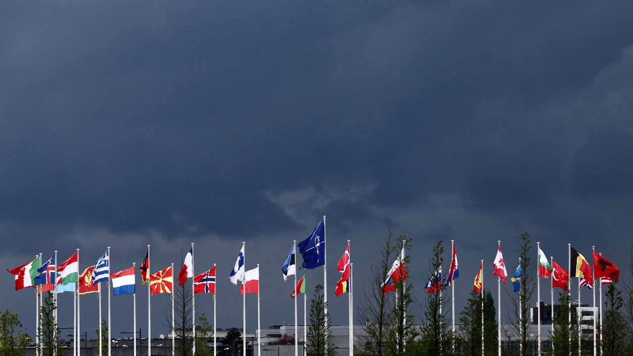 FILE PHOTO: National flags of the Alliance's members flutter at the NATO headquarters in Brussels
