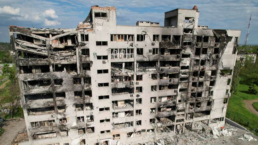 A view shows a destroyed residential building in Mariupol