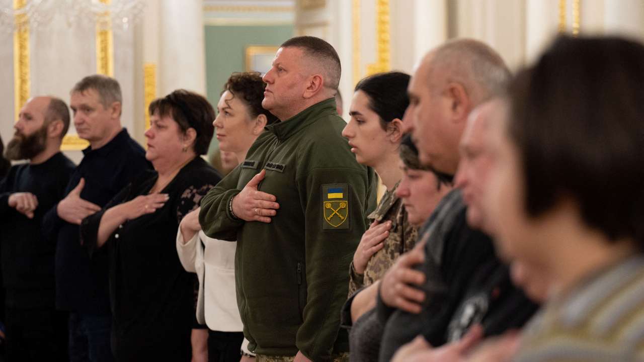 Former UAF Commander in Chief Zaluzhnyi sings a national anthem during an award ceremony in Kyiv