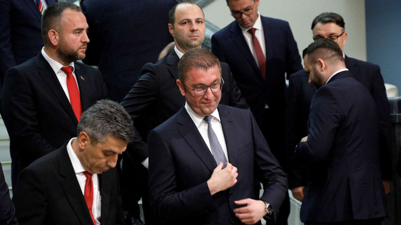 Hristijan Mickoski leader of the ruling VMRO party poses for a picture with newly elected ministers at the Macedonian parliament in Skopje
