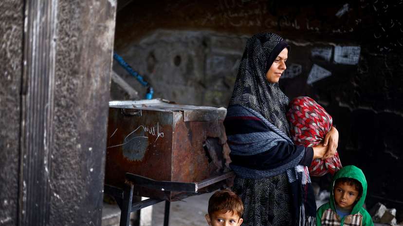 Palestinians prepare to flee Rafah after Israeli forces launched a ground and air operation in the eastern part of the city