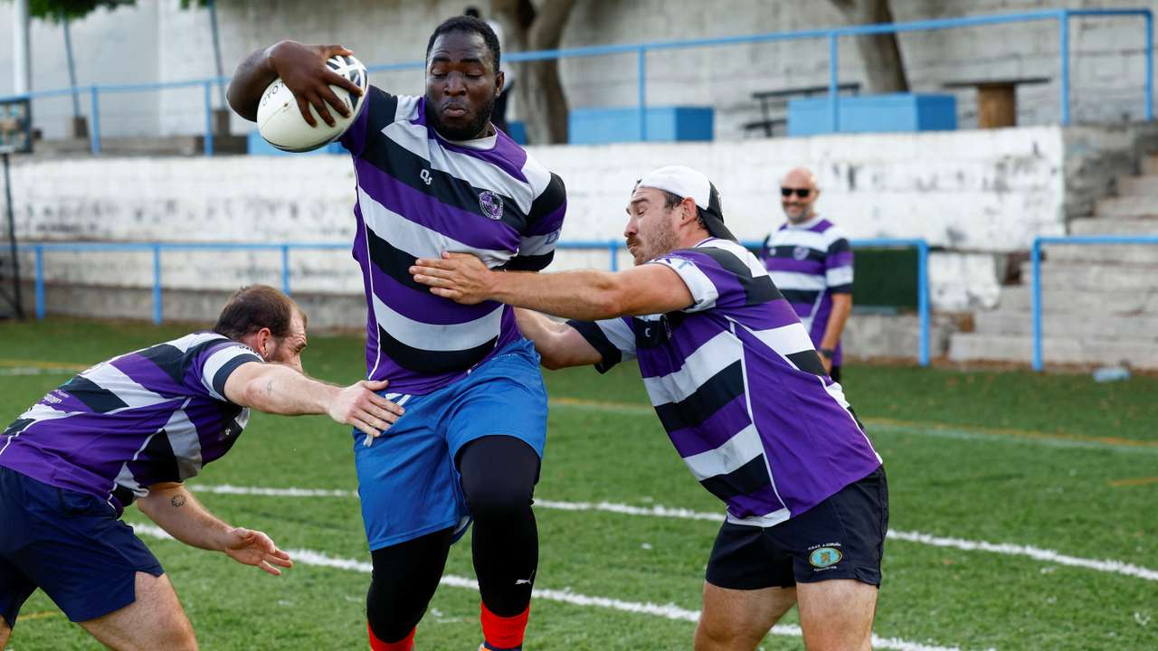 Moussa Diaby, 20, a migrant from Mali, trains during the first day of training with his new rugby team Crull