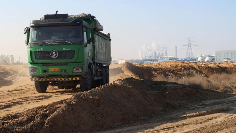 Truck drives at a construction site near Yuheng industrial area in Yulin
