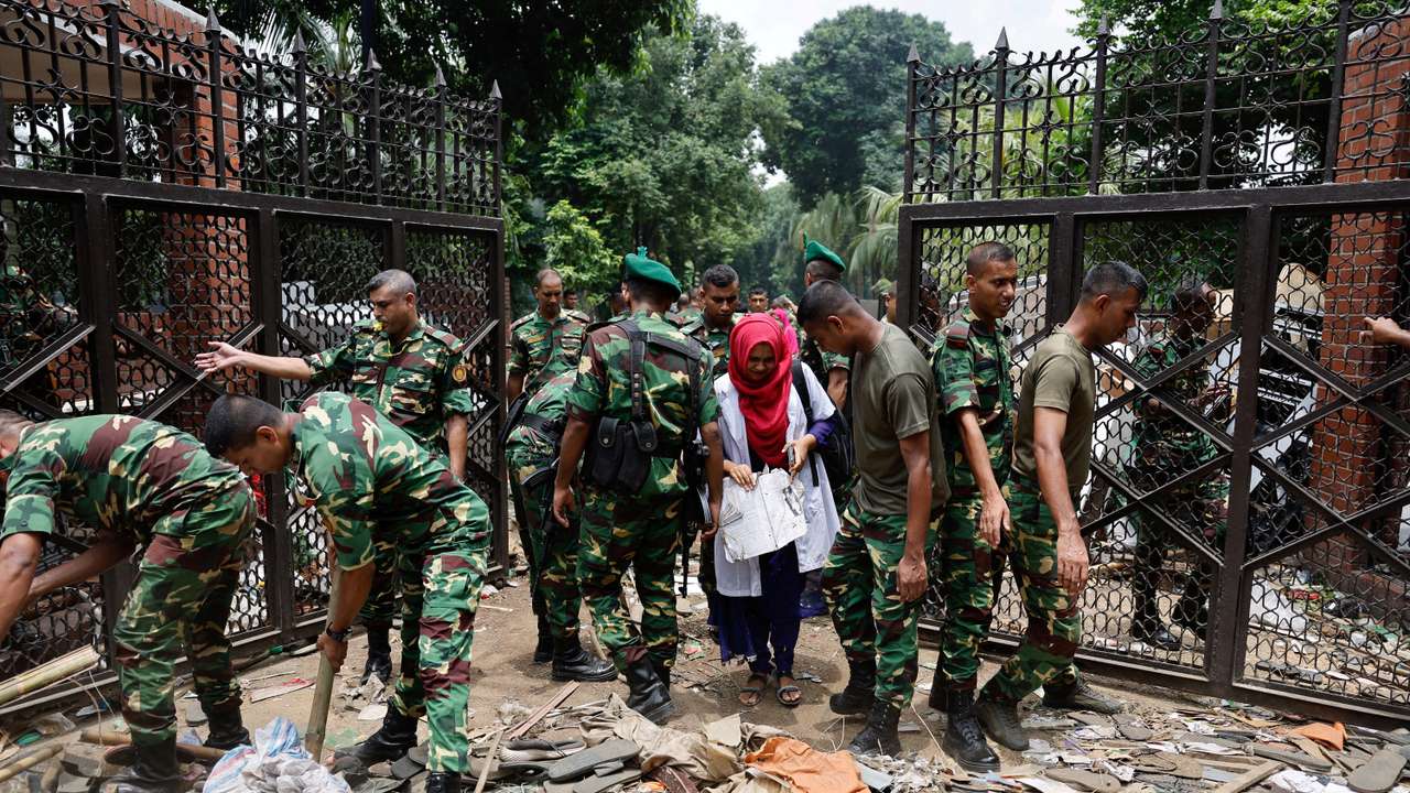 FILE PHOTO: Army members clear an entrance of the Ganabhaban after Bangladeshi PM Hasina's resignation, in Dhaka