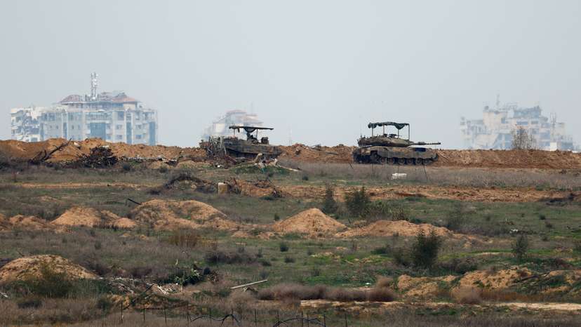 Israeli military vehicles operate in Gaza