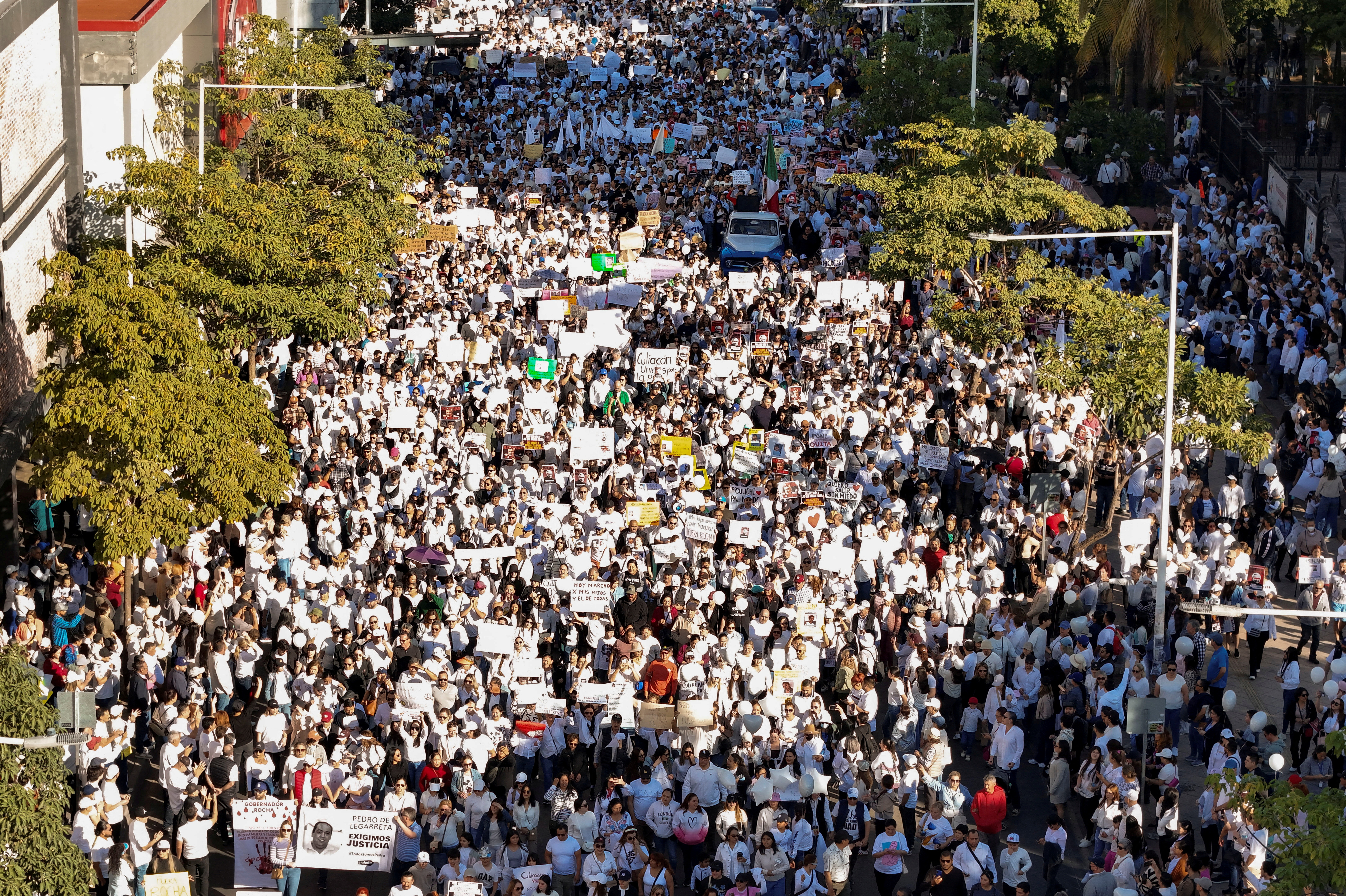 A drone view shows people during a march to press authorities to address escalating regional drug-related violence in Culiacan